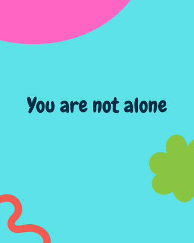 You are not alone typed on colourful background